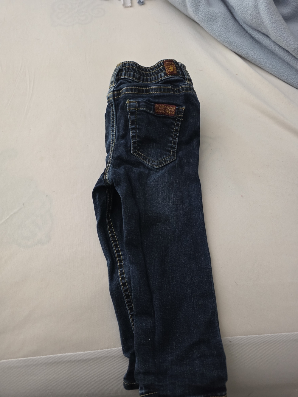 7 For All Mankind Infant Jeans in Dark Blue with Gold Stitching